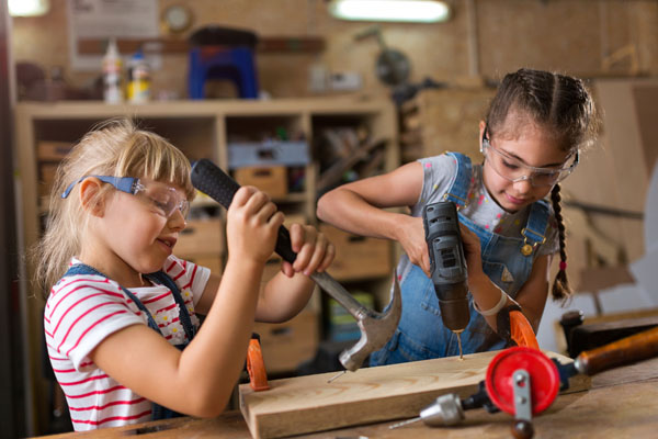 kids working in a garage space