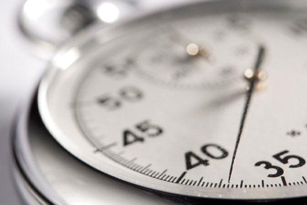 image of a stop watch depicting timing of painting spray foam insulation