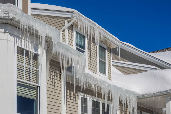 image of an ice dam depicting home without proper insulation