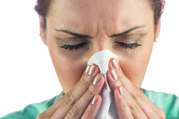 woman suffering from allergies
