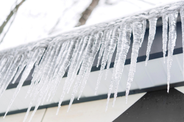ice dams on the roof of the house
