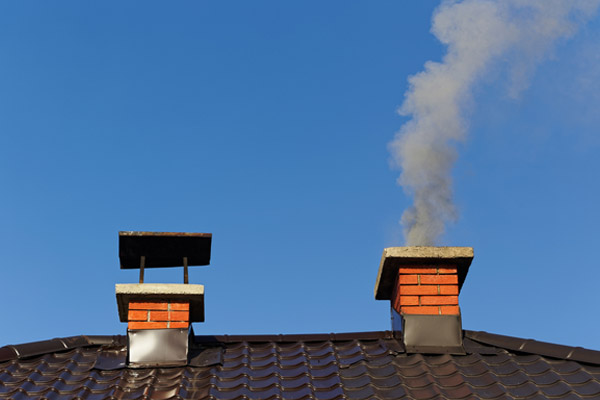 image of smoke coming from chimney depicting chimney insulating services fort collins co