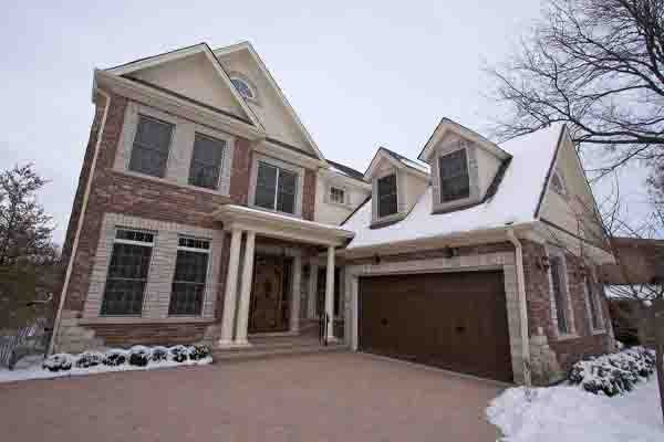 image of a house in winter that has spray foam