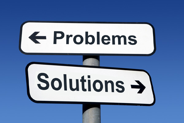 image of problem solutions sign depicting spray foam insulation problems