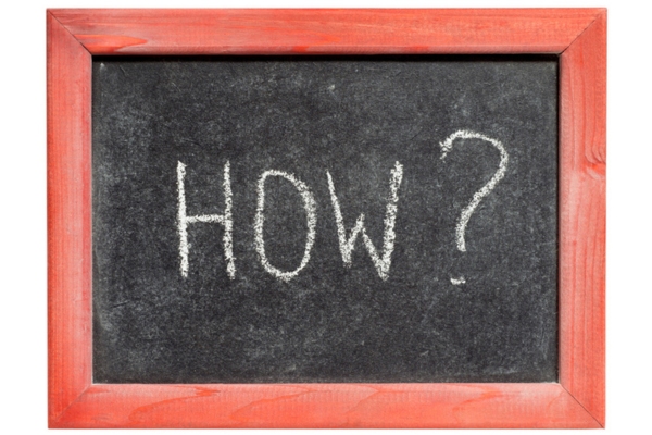 HOW written on a chalkboard depicting R value calculation
