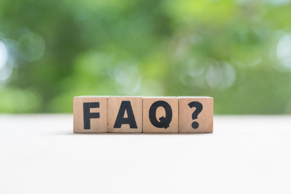FAQ spelled using wooden letter blocks depicting questions about Spray Foam Insulation