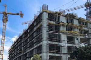 image of a commercial building construction site depicting concrete wall insulation