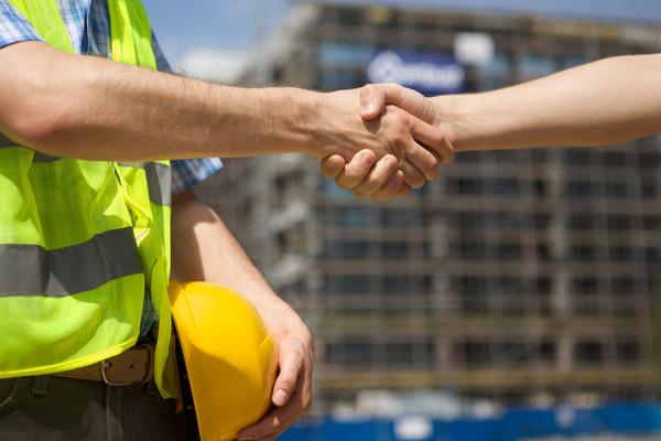 image of a insulation contractor shaking hands
