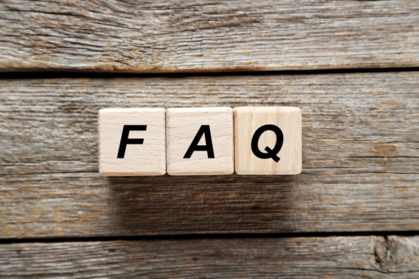 FAQ spelled using wooden letter cubes depicting questions about Home Insulation