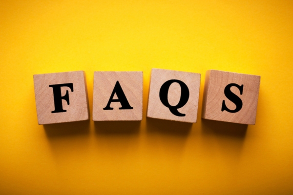 FAQS spelled using wooden letter cubes depicting Insulating Materials questions