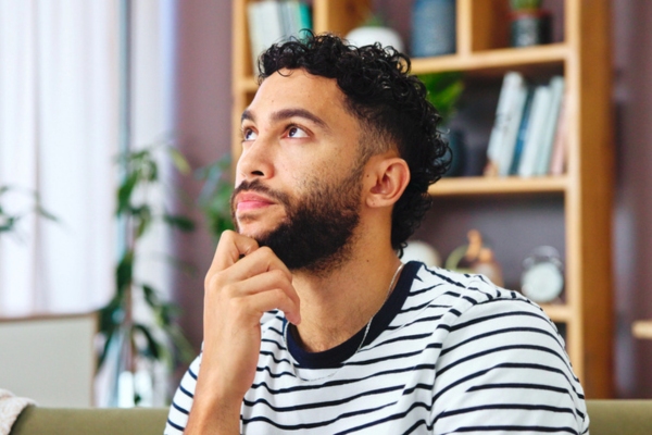 man thinking depicting understanding the Connection Between Insulation and Moisture Control