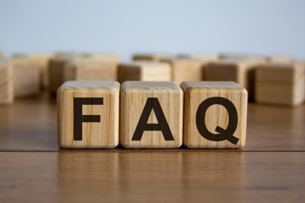 FAQ spelled using wooden letter cubes depicting Air Conditioning Safety questions