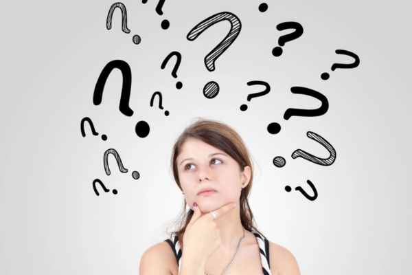 image of a thinking woman with question mark doodles on top of her head depicting Choosing the Right Energy-Efficient Air Conditioner for Your Home