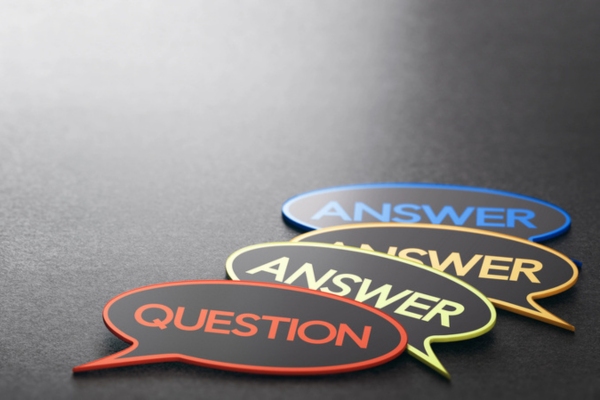 question answer written on a speech bubble depicting Energy-Efficient Air Conditioner FAQs