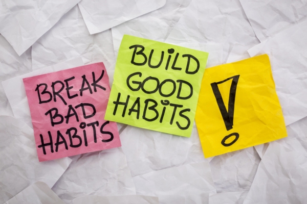 break bad habits build good habits written on a crumpled sticky note depicting air conditioning system care