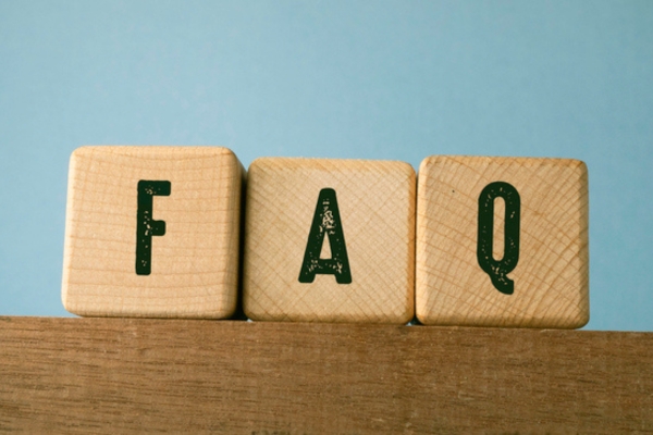 FAQ spelled using wooden letter cubes depicting Insulation and Ventilation questions