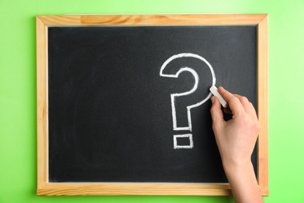question mark on a chalkboard depicting Hot and Cold Spots in House FAQs